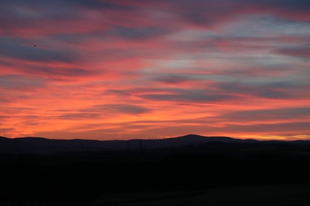 Scenic view of sunset sky over landscape