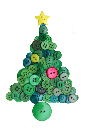 Christmas tree shape made from buttons on a white backgroundの写真素材