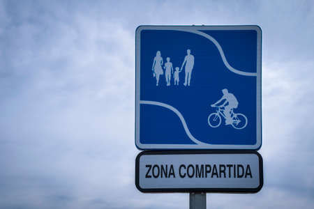 A shared zone sign indicating where pedestrians and bicycles share the areaの写真素材