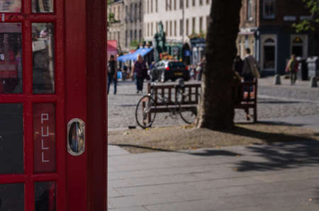 A phone red booth on the streets of Edinburgh, Scotlandの写真素材