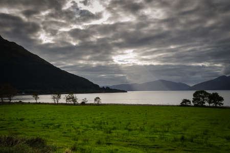 Sunbeams passing through the clouds in the Loch Eil, Fort William, Scotland