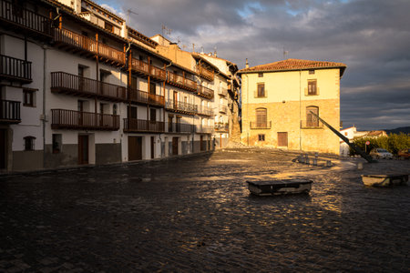 Wet cobbled street after the rain in Morella at sunset, Castellon ,Spainの写真素材