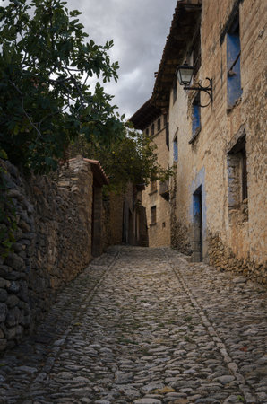 Cobbled streets and stone houses in the medieval village of Mirambel, Teruel, Spain