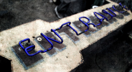 Neon Blue Entrance sign Arrowの写真素材