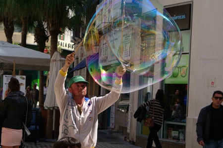 Malaga (Spain) Larios street. 17 March 2012. Street entertainer making bubblesのeditorial素材