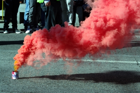 Seville, Spain, 14 November 2012.- A smoke pot at the demonstration in the General strike 30のeditorial素材
