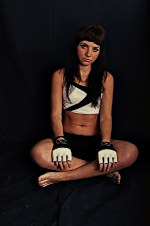 Sitting boxing girl の写真素材