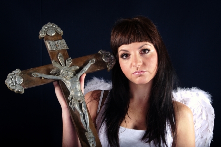 Angel with crucifix の写真素材