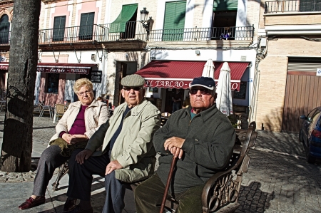 Carmona, Seville, 6th February 2013: Urban life 10: Old people in the sunのeditorial素材