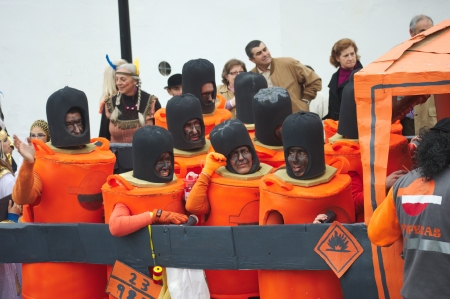 Carmona, Seville, 16th February 2013: The Carnival Parade 10:  People in fancy dresses (mock gas tanks)のeditorial素材