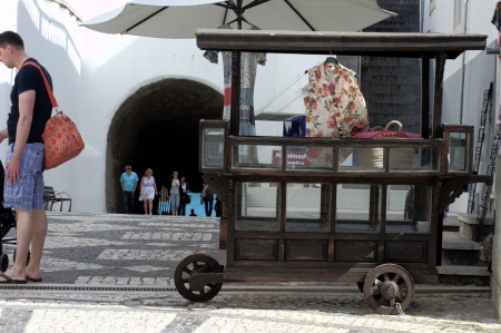 Albufeira (Portugal) 17th May 2013: Street photo: Wooden ancient cartのeditorial素材