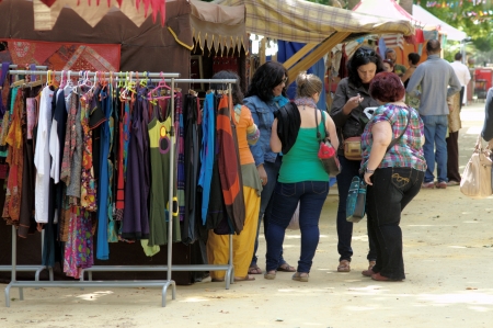 Carmona (Sevilla), Spain, 8th June 2013: Street Photography. Medieval Market.. People buing clothesのeditorial素材