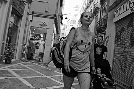 Malaga (Spain) 28th June 2013: Street photography. young lady in the streetのeditorial素材