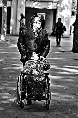 Sevilla  Spain  16-11-2013  Street photography  Invalid on a wheel chair 47のeditorial素材