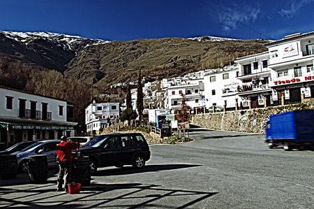 La Alpujarra  Granada  20th February 2014 - The square of one village  with the mountain in the backgroundのeditorial素材