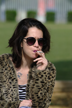 With sunglasses and smoking の写真素材