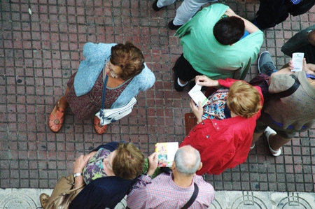 Lloret de Mar (Girona) Spain - 20-10-2014 Urban life - People waiting outside a hotel