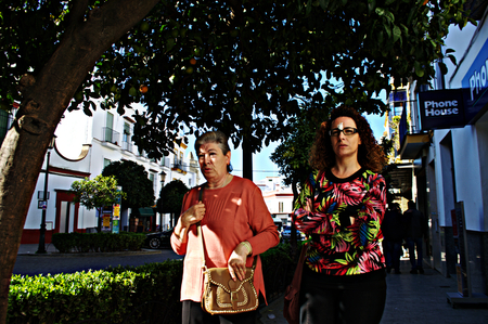 Carmona, Seville, Spain, 6th November 2014 Urban life - Ladies walking in the street 16のeditorial素材
