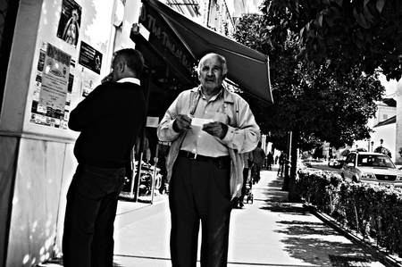 Carmona, Seville, Spain, 6th November 2014 Urban life - Men walking in the street 20のeditorial素材