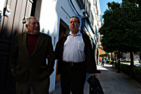 Carmona, Seville, Spain, 6th November 2014 Urban life - Man walking in the street 2のeditorial素材