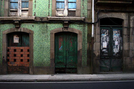 Tui - Galicia - Spain - July 9, 2015 Derelct houses in the town centerのeditorial素材