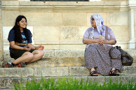 Seville, Spain, July 29 2015 - Urban life - Two women sitting and having a restのeditorial素材