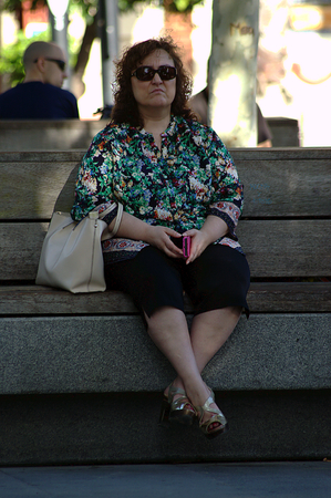 Sevilla -Spain- July 29 2015 - Urban life - Woman sitting on a bnechのeditorial素材