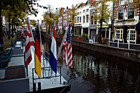 Netherlands, Alkmaar, 9th, October, 2015 - Canals with flagsのeditorial素材