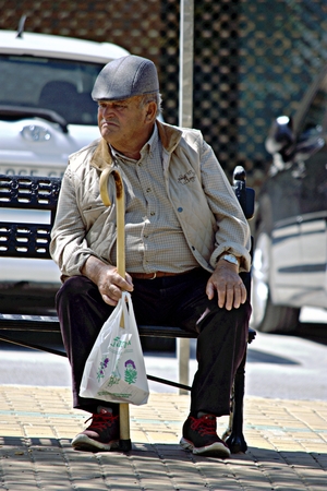 Carmona (Sevilla) Spain 9th April 2016 - Old man sitting in the sunのeditorial素材