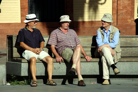 Seville, Spain, 14th September 2016, Seniors sitting in the sunのeditorial素材