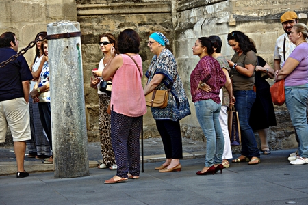 Sevilla (Spain) 27th September 2016 - Urban life - People quieing to visit a monumentのeditorial素材