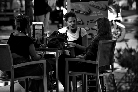 Seville, Spain, 27th September, 2016 - Urban life  - Young lady sitting outdoorsのeditorial素材