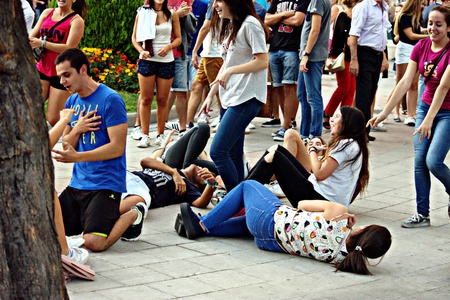 Granada, Spain, 1st October 2016 , Urban life: Group of youngsters acting in the street