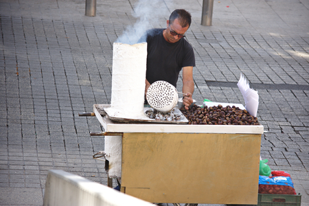 Seville, Sain, 1st November 2016 - Urban life - Baked nuts sellerのeditorial素材