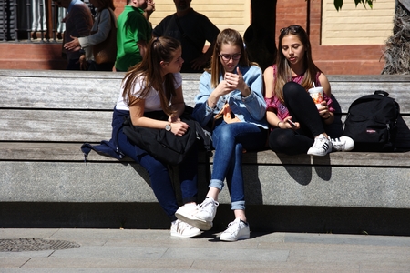 Seville, Spain, 3rd April 2017 - Urban life: Young ladies in the streetのeditorial素材