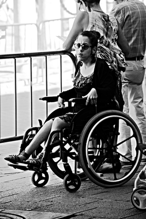 Seville, Spain, 29th May 2017 - Urban life - Invalid lady on a wheelchairのeditorial素材