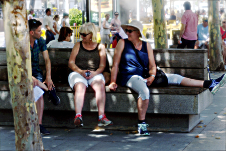 Sevilla, 14-June-2017- Dreamy Urban life - People sitting in the streetのeditorial素材