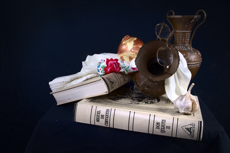 Still life with books and copper potsの写真素材