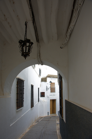 Narrow street with archのeditorial素材