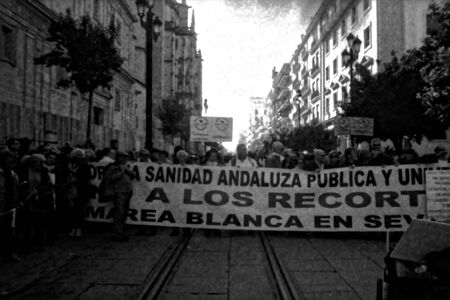 Seville, 18th January 2020. This is a photograph from an analog negative. Urban life: demonstration in bealth of  the public Health Serviceのeditorial素材