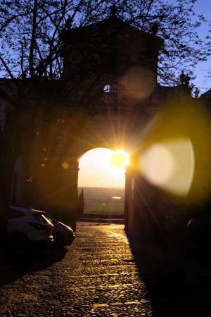 This is a sunrise in the Gate of Cordoba. This is a monument from Roman times in Carmonaの写真素材