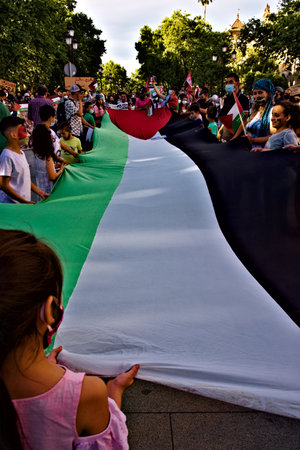 The latest crimes have triggered a popular response and protest. This is a demonstration in Sevilleのeditorial素材