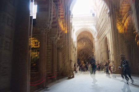 This is the interior of Cordoba Mosque. It is one of the most important Muslim buildings. After the Conquest of Andalusia by the Christians, it was turned into a Christian cathedral. And there are a number of Baroque altars that have spoiled the monumentの写真素材