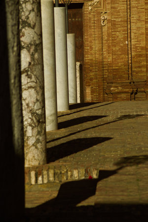 These are columns in the historical center of Carmona. On a sunny morning