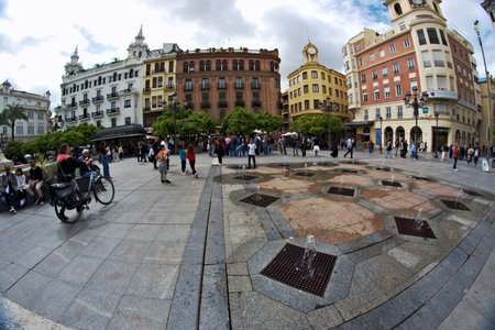 This square is just the very center of Cordoba. It is always full of people are re nice fountains just at the ground levelの写真素材