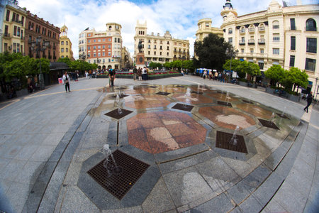 This square is just the very center of Cordoba. It is always full of people are re nice fountains just at the ground levelの写真素材