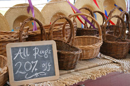 Baskets and rugs for sale at an outdoor market