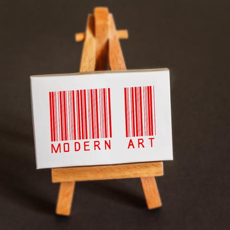 The Words Modern Art printed in an Interesting Font on Canvas upon an Easelの写真素材