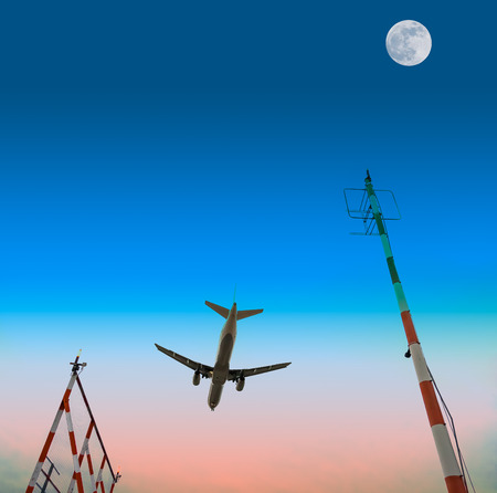 Airplane under the Moonの写真素材