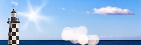 Panoramic View of the Ocean with a Lighthouse and Blue Skyの写真素材